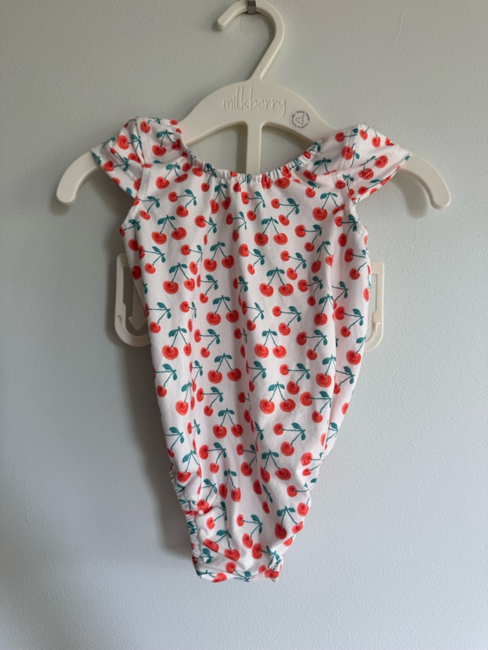 Bailey’s Blossoms White Cherry Print Girls One-Piece Romper